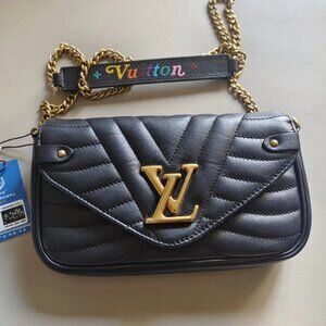 Authentic black Louis Vuitton New Wave chain bag for personal use.